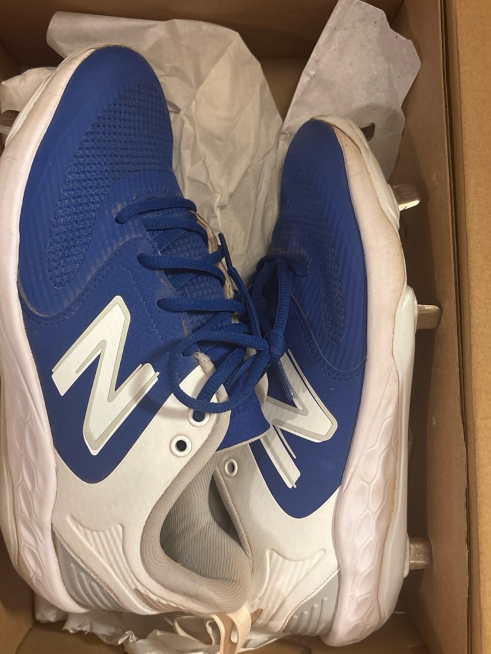 New Balance women's Blue and White Athletic Cleats